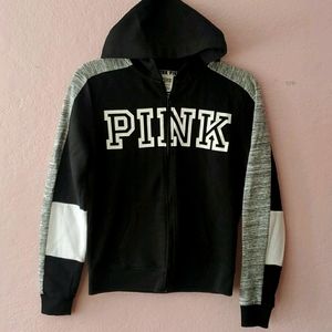 Pink sweatshirt.